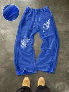 These men's printed sweatpants feature a minimalist streetwear design adorned with abstract gothic patterns. They have a relaxed fit, wide legs, an elastic waistband, and are made of Soft distressed cotton with delicate frayed edges.