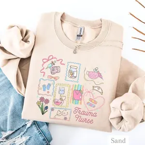 Trauma Nurse Sweatshirt/Hoodie/T-Shirt, Cute Pink Nurse Graphic Hoodie, ER Trauma RN Gift, Nursing Aesthetic Shirt For Women and For Men