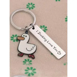 Cute cartoon duck stainless steel keychain, fashionable letter carved slogan metal keychain, backpack crossbody bag decoration, cute accessories, couple gifts, creative gifts