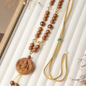Top-grade Chinese herbal bracelet with osmanthus fragrance and yellow wealth god necklace