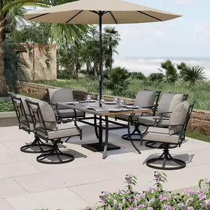 7-Piece Patio Dining Set – 6 Swivel Rocker Chairs with Olefin Cushions & Faux Woodgrain Dining Table