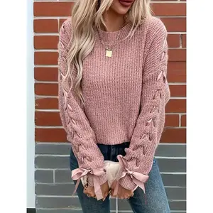 Women’s soft pink oversized bow sweater — cozy loose-fit long-sleeve round-neck winter sweater with medium stretch; an essential layering piece for casual and semi-formal outfits; warm women’s winter sweater; soft pink sweater for fall.