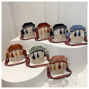 Includes shipping fee. Premium-feel 2026 new women’s fashion bag, ethnic style niche woven bucket bag, can be worn on one shoulder or crossbody, with tassels.