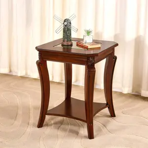 A cherry-colored European-style carved glass side table