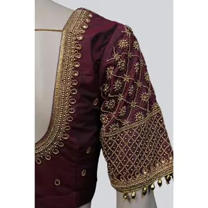Luxurious Aari-Work Bridal Blouse with Fancy Tassels by JCS Fashions