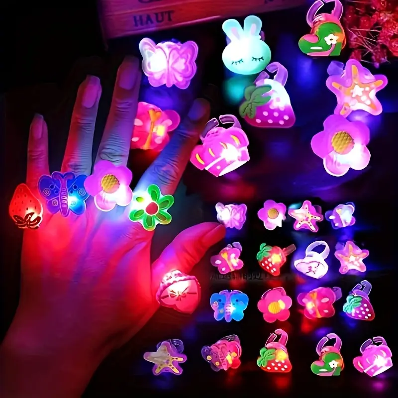 50pcs Novel Luminous Ring Toys, Party Supplies, Easter Fillers, Christmas Gifts, Halloween Gifts, Children'S Day Gifts, Classroom Prizes, Candy Belt Fillers, MultipleStyles Of Random Patterns, Children'S Party Gifts, Colorful Finger Toys