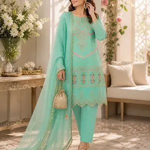 Party Wear Kameez Shalwar in Mint Green with Floral Embroidery and Lace Details