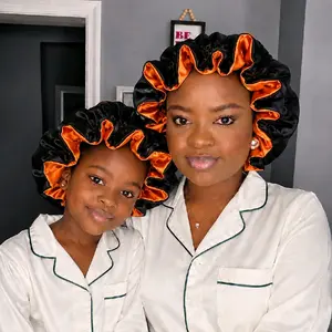Reversible Orange and black bonnet  Shower