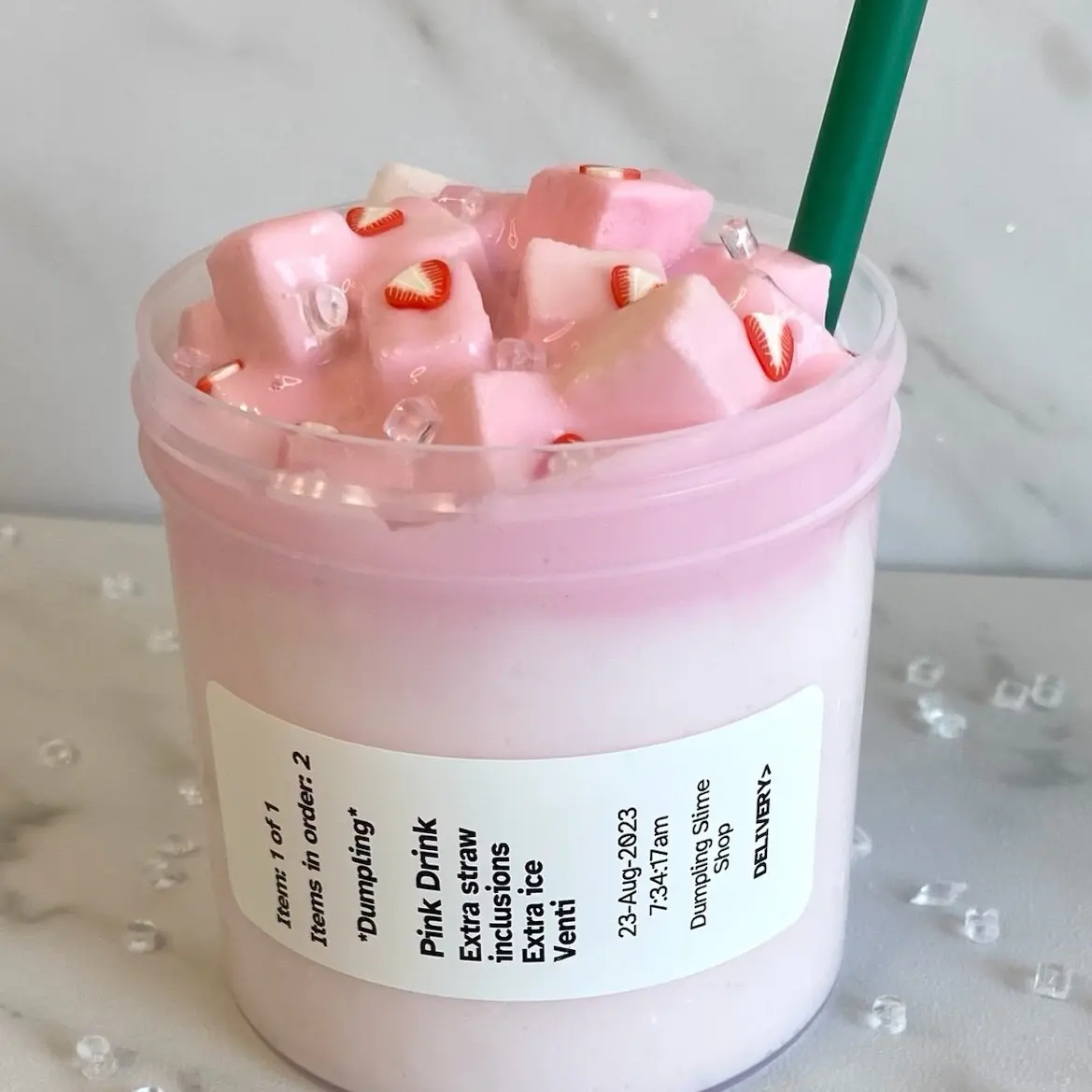 Pink drink slime, thick ans glossy with jelly cubes