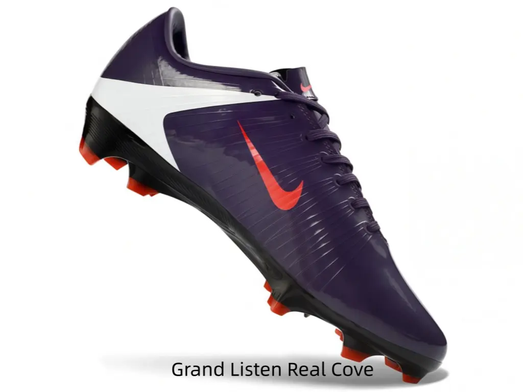 Low-cut sleek firm-ground football boots with smooth shiny synthetic upper