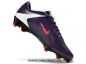 Low-cut sleek firm-ground football boots with smooth shiny synthetic upper