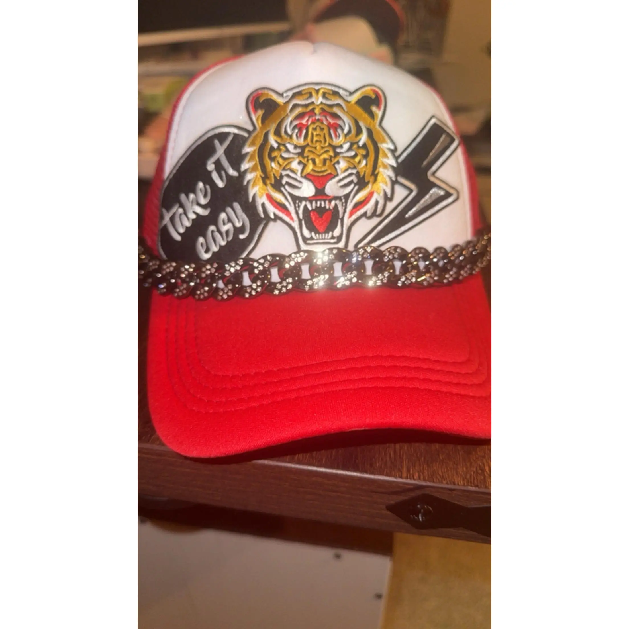 Trucker Hat with Bling Chain - Red and White Design, "Take It Easy" Text, Tiger and Lightning Bolt Motif