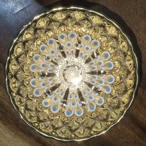 Luminous Gold - Toned Porcelain Teacup with Peacock Feather Design