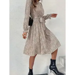 A women's leopard print long sleeved Boho Chic dress with elegant temperament and versatile commuting style