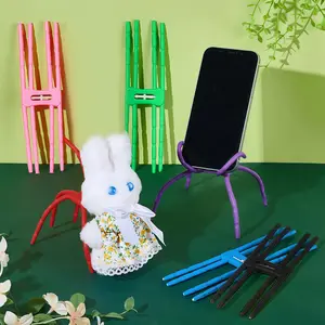 "Flexible Spider-Shaped Phone Holder – Multi-functional and portable, adjustable, suitable for smartphones and tablets, can be used as a car mount, desktop stand, and universal plush toy stand"
