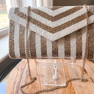 Gold and white beaded purse clutch with removable gold chain.