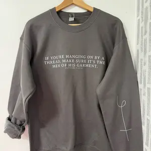 If you’re hanging by a thread make sure it’s the hem of his garment crewneck. Arm sleeve design.