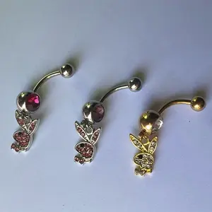 Playboy Bunny belly piercing