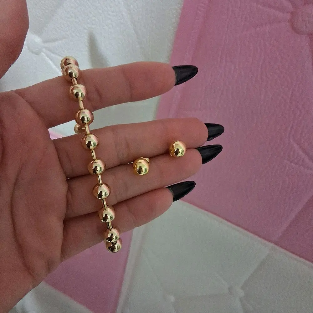 14 k gold laminated bead braceled and Errings set.