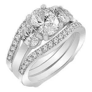 Radiance by Absolute™ 5.39ctw 3-Stone Oval Engagement Ring Set