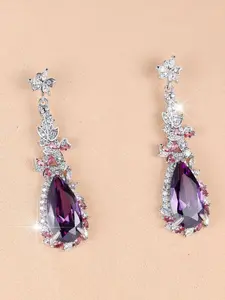 A pair of purple glass patterned synthetic crystal dangle earrings, stylish and high-end, suitable for women to wear as everyday earrings for special occasions like weddings.