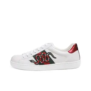 These Snake-Detail White Kicks Go With Every Outfit