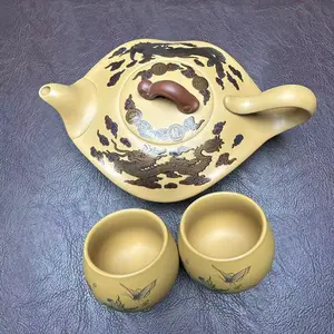 Handcrafted Tea Pot with Painted Phoenix and Dragon Design Changes Color when Hot Water is Added Includes Matching Cup.H015
