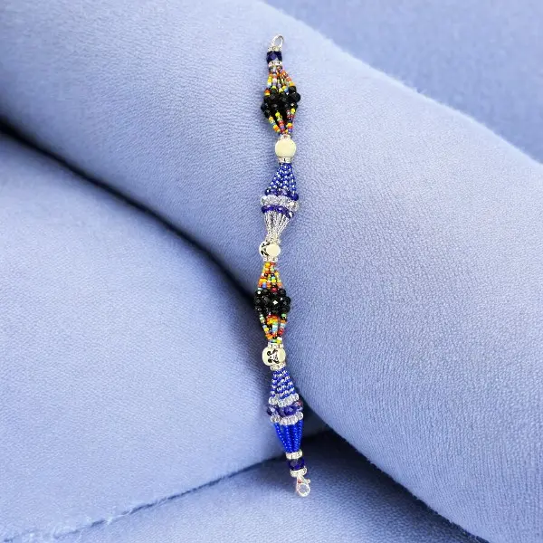 Muerto 7 Color Pulvera Santeria Yemaya Beaded Bracelet with Colorful Beads and Unique Design Cultural Accessories 8 Inch Statement Piece