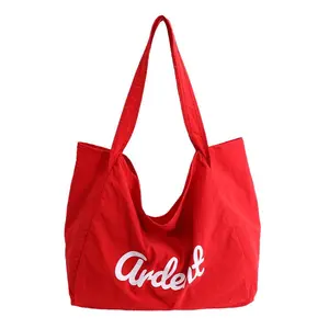Summer new canvas bag bag large capacity shopping bag commuter shoulder bag simple letter drawstring hand bag