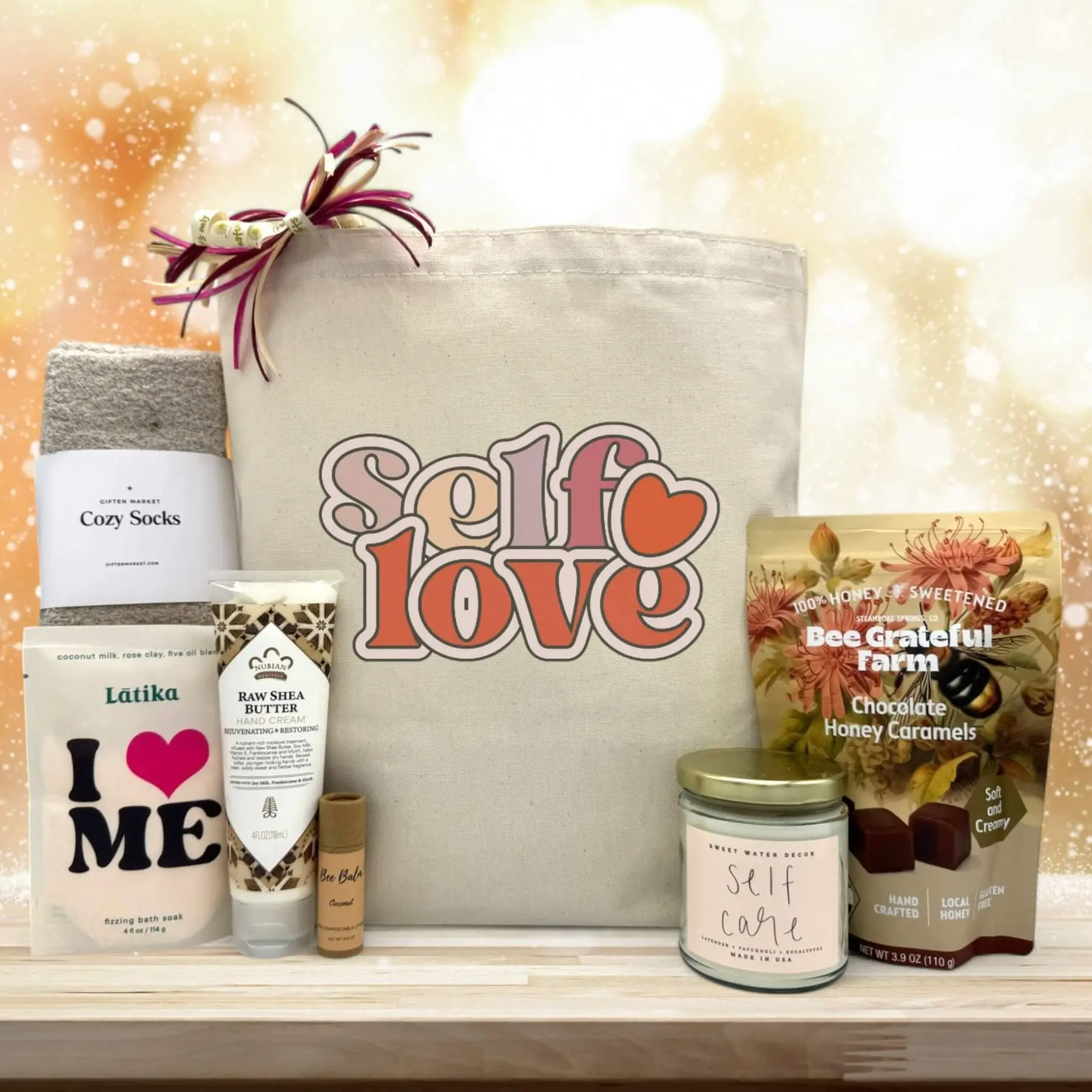 Itsonlynaturalgifts Self Love Gift Basket with Cozy Socks Latika Bath Soap Raw Shea Butter Honey Caramels and Self Care Candle