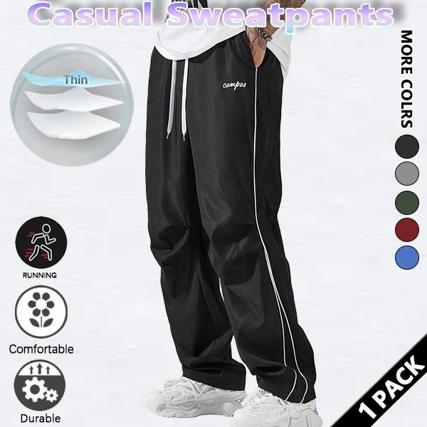 Loose-fitting sweatpants for men, grey side stripes with gold accent stripes, comfortable design, sports casual style bottoms, sweatpants, fitness wear, today's fashion outfit