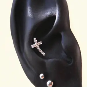 Curved Cross Conch earring, simple cartilage earring, sparkly gold earring, CZ paved cross earrings, lined helix earrings, bent cross studs