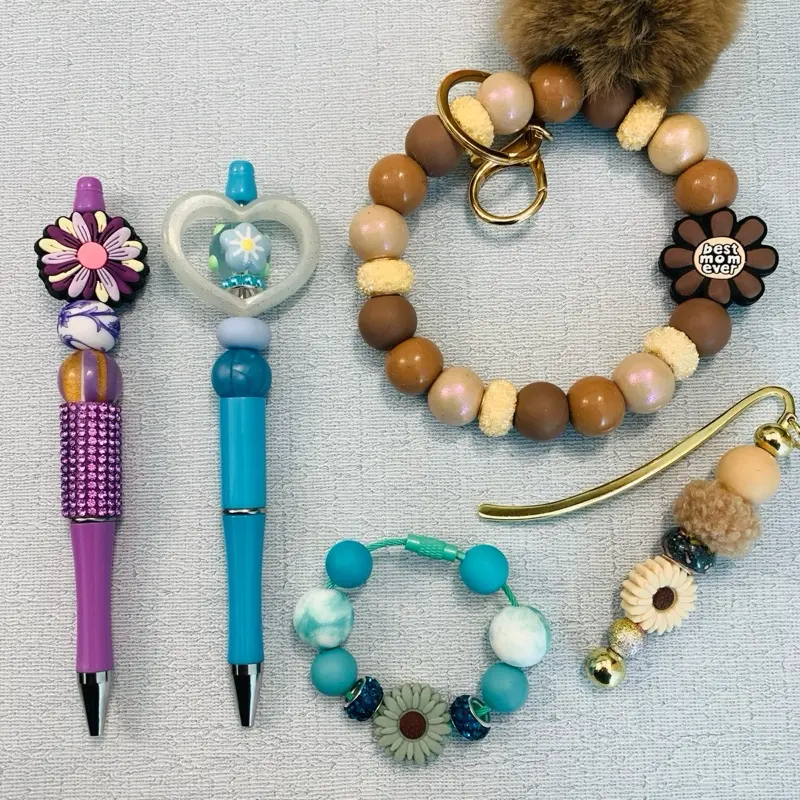 Mystery Bags Claim on Live Assorted Beadable Items Pens Mechanical Pencils Keychains with Colorful Beads and Unique Charms