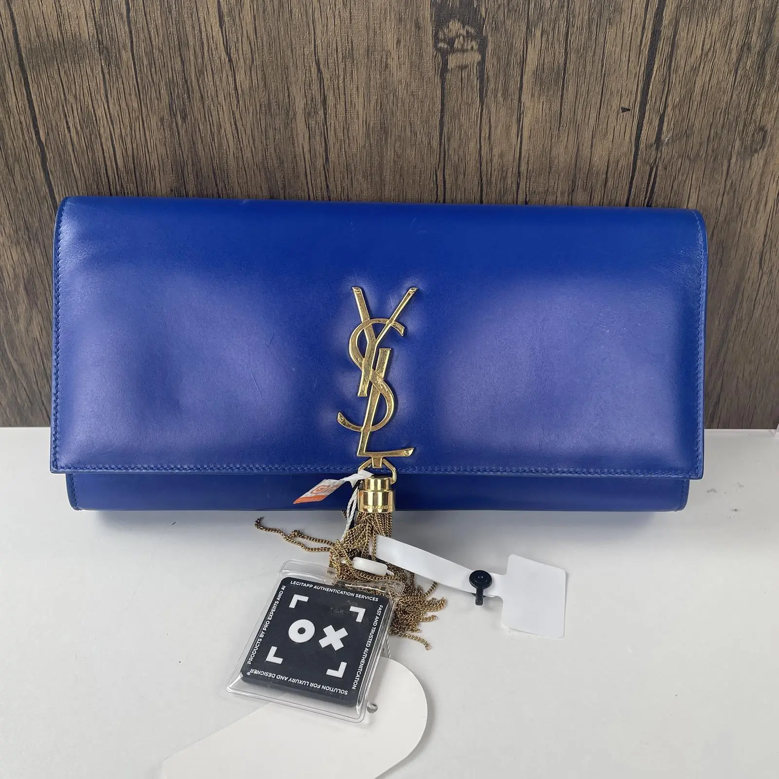 Pre-owned Yves Saint Laurent leather Clutches & Wristlets YSL Royal Blue Smooth Large Tassel Clutch Bag with chain