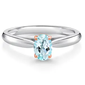 Gem Stone King 925 Sterling Silver and 10K Rose Gold Prongs Sky Blue Topaz Solitaire Engagement Ring For Women (0.50 Cttw, Oval 6X4MM, Gemstone November Birthstone)