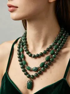 A classical and luxurious style emerald multi-layered bead necklace, with natural green stone chains and hand carved details, suitable for daily commuting, dinners, and dates. It is also a charming and exquisite small gift that can make you feel moved
