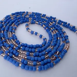 Waistbeads -This is Dream,this beautiful piece. He is blue and rose gold. He is 60 inches long fits up to a 4X can customize it up to 70 inches. This is for everyone.