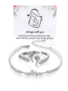 Mother's Day "Angel Mom" ​​Bracelet & Miscarriage Memorial Ring — Adjustable Infinity Bangle. An Angel Baby Commemorative Bracelet featuring Angel Wings and Footprints—Memorial Jewelry for a Lost Loved One. A Gift for the Strongest of Moms.