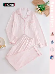 Two-piece pink ladies' pajama set with full-color prints. Button-front collar shirt and elastic waist pants pajama. Casual and comfortable collar long-sleeved top and long pants pajama set. Ladies' pajamas for spring and autumn.