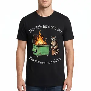 "This Little Light Of Mine" Raccoon Dumpster Fire Meme T-Shirt - Funny Raccoon Graphic Tee - Hilarious Sarcastic Statement Top - Dark Humor Chaos Theme Apparel - Casual Short Sleeve Crew Neck Graphic Shirt