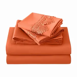 Luxurious Orange Bed Sheet Set with Elegant Lace Detailing for a Comfortable Sleep Experience. King size