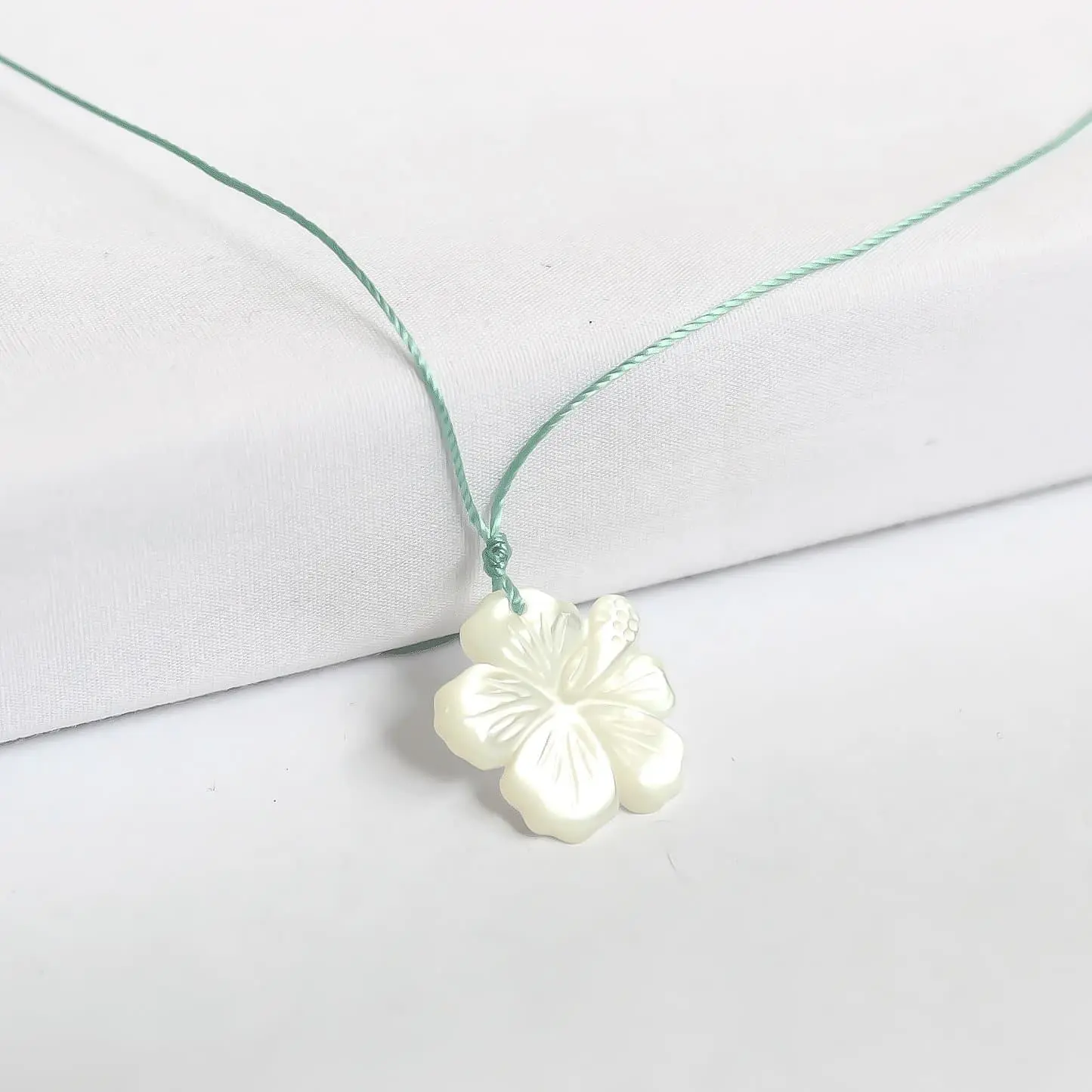 Carved Hibiscus Necklace