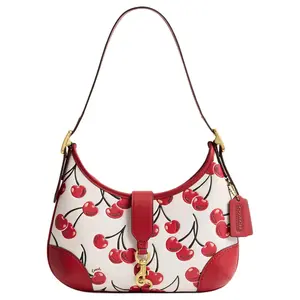 COACH Hamptons 27 Cherry-Print Zip-Top Leather Half-Moon Handbag for Women in Tan with Brass and Chalk Accents