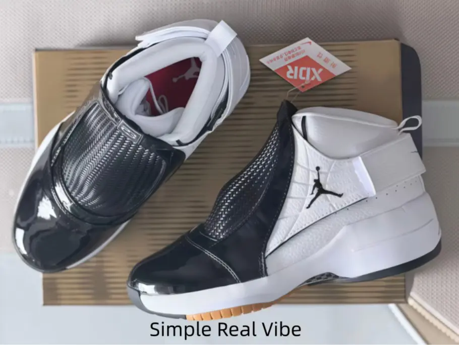 Contrast Black White Laceless Athletic Sneakers, Black Jumpman Logo On White Side Panel, Red Fabric Inner Lining, Thick Foam Cushion Midsole For Long Distance Training