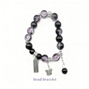 Purple Crystal Butterfly Charm Bracelet with Shimmering Beads and Silver Charms for Elegant Everyday Wear