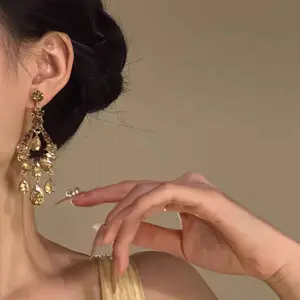 French vintage champagne gold tassel earrings, light luxury, high-end, elegant, suitable for formal wear, stylish earrings, luxurious jewelry