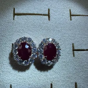 <PingEast Jewelry>Ruby earrings--925 Sterling Silver Rose Gold–Plated Sunflower Stud Earrings featuring a 6×8 mm oval natural Burmese Pigeon Blood Ruby (2 carats). A refined, luxurious design that elegant temperament. Comes with a certificate