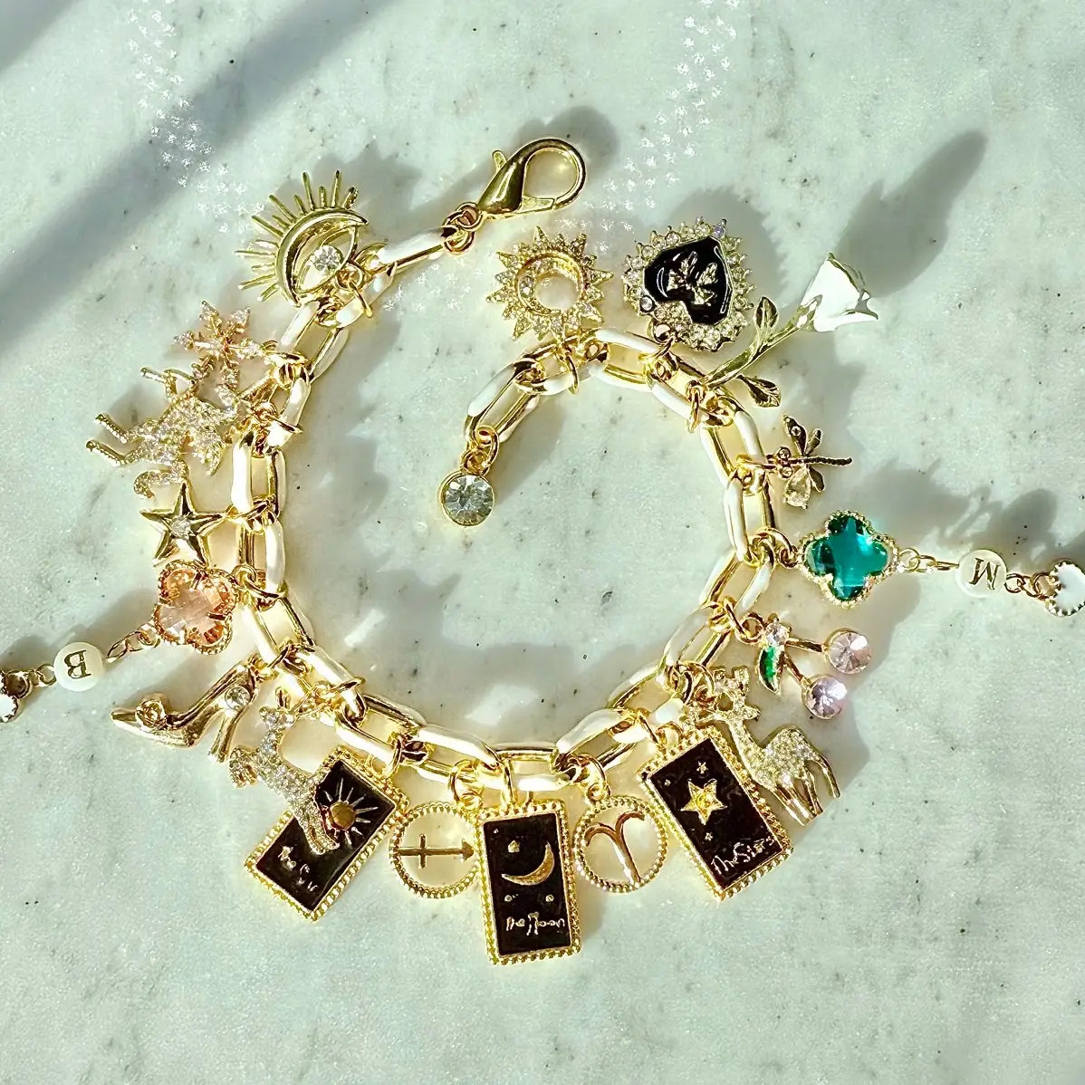 Custom charm bracelet 14k -18k Gold Plated,Silver plated or stainless steel adjustable chain options. Featuring gold plated charms.