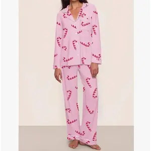Women’s Christmas satin pajama set with candy cane print, long-sleeve button shirt and pants—cute holiday home wear for fall and winter