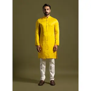Yellow linen satin kurta and cream pants